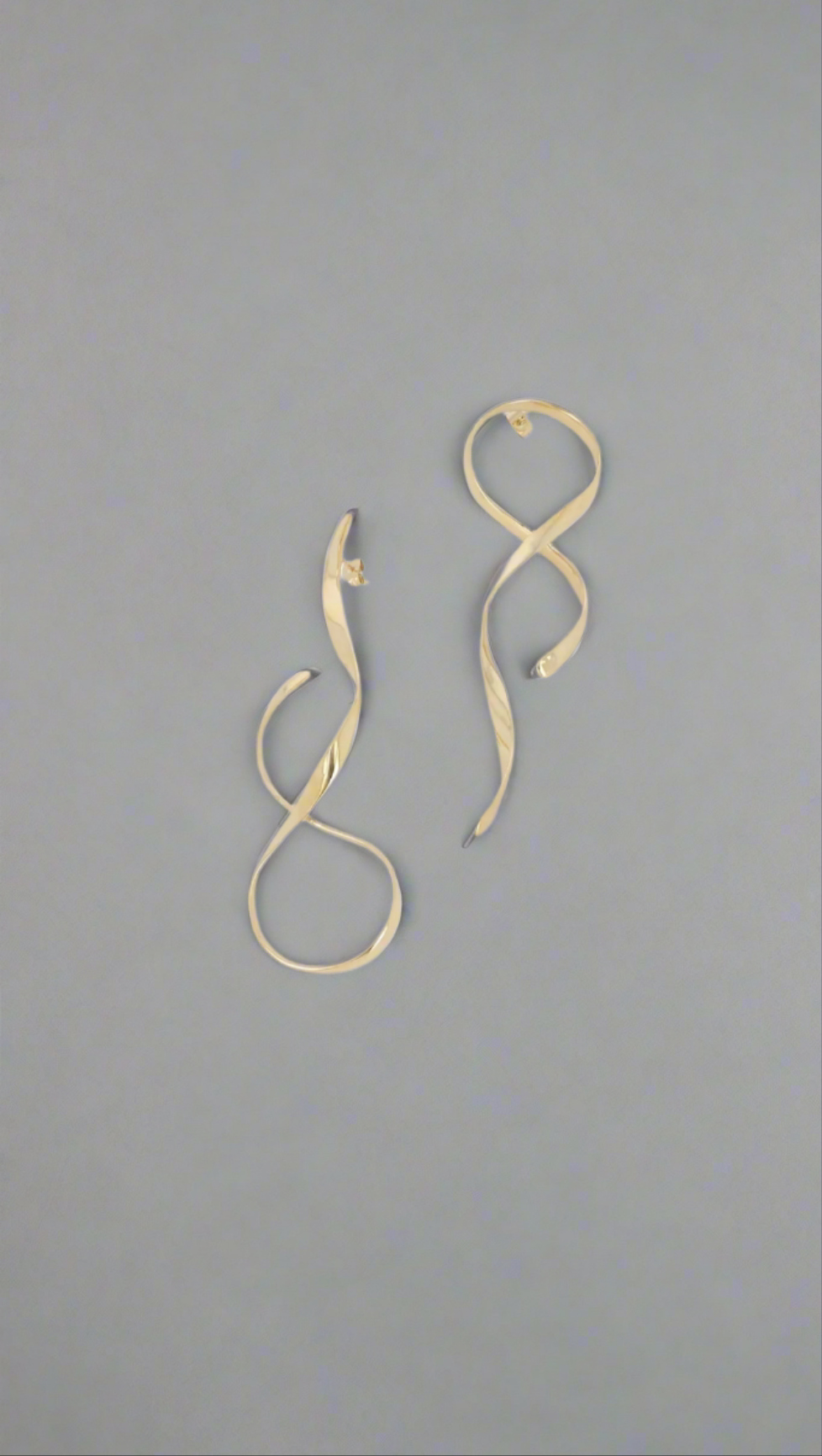 Boucle d'oreille asymétrique
