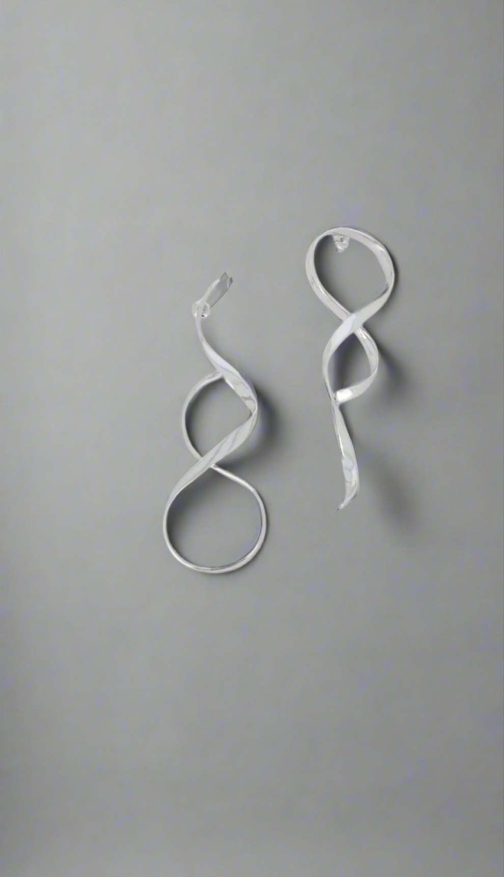 Boucle d'oreille asymétrique