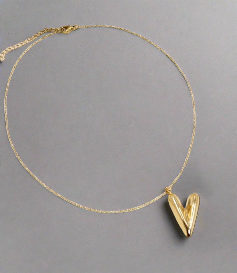 Collier cœur doré