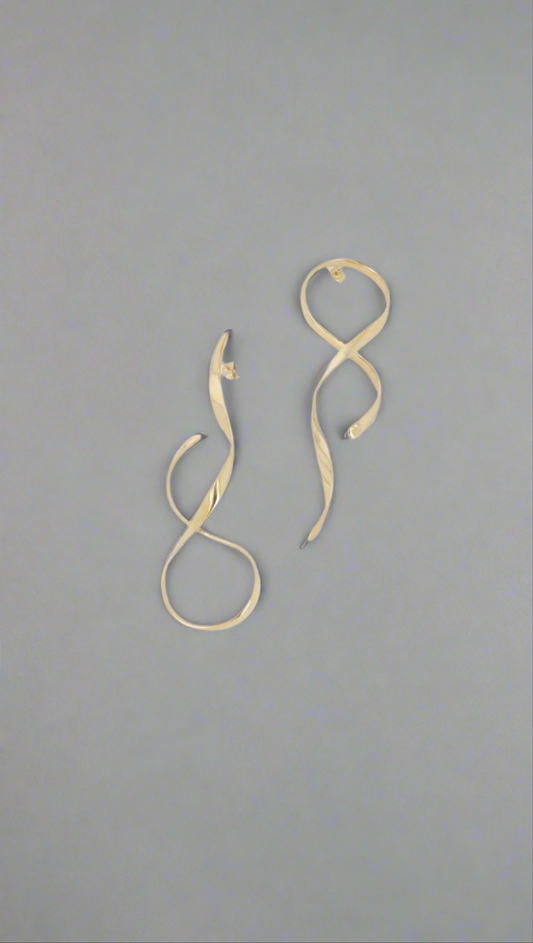 Boucle d'oreille asymétrique