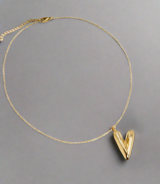 Collier cœur doré